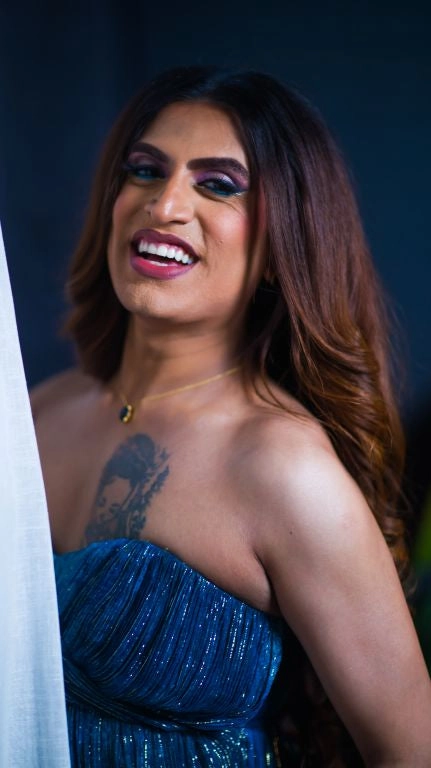 Shushant in our Jade Blue Printed Drape Gown With Sweet Heart Neck & Slit From Matrix Collection